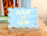 Alpha Xi Delta Scallop Acrylic Shelfie lifestyle photo